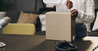 Buy stock photo Content creator, box and hands of person in home for recording, unboxing and product review. Influencer, live streaming and woman with package, parcel and opening for  online shopping for podcast