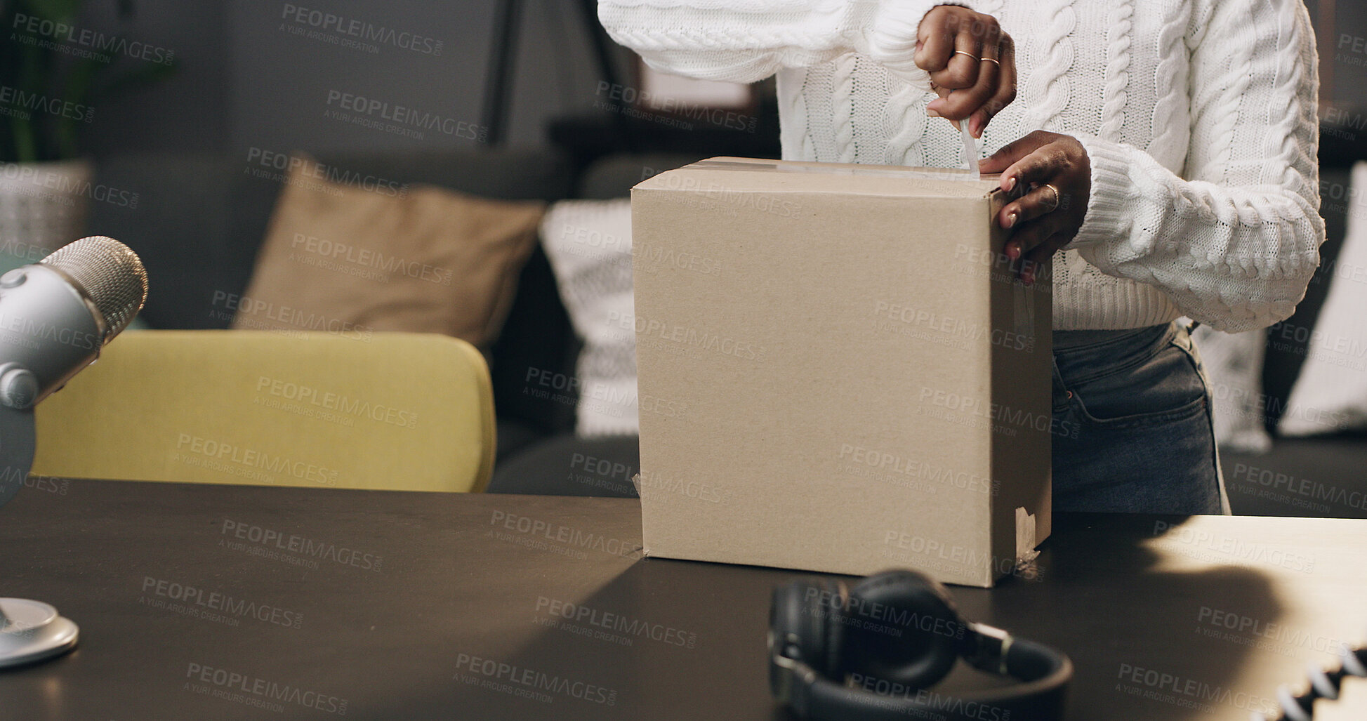 Buy stock photo Content creator, box and hands of person in home for recording, unboxing and product review. Influencer, live streaming and woman with package, parcel and opening for  online shopping for podcast