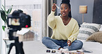 Influencer, live streaming and black woman with makeup in home for product review, beauty tutorial or opinion. Content creator, social media and person talking in bedroom with cosmetics for broadcast