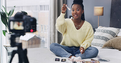 Buy stock photo Influencer, live streaming and black woman with makeup in home for product review, beauty tutorial or opinion. Content creator, social media and person talking in bedroom with cosmetics for broadcast