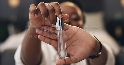 Buy stock photo Influencer, lipgloss and hands of woman with makeup in home for opinion, how to and tutorial. Content creator, showing and person with cosmetics for product review, beauty tips and social media