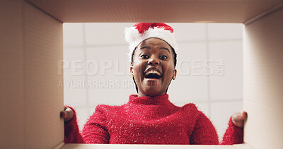 Buy stock photo Christmas, open and pov of black woman with box and omg reaction for present, gift and package. Happy, below and portrait of person with parcel for surprise, wow and shock for celebration or holiday