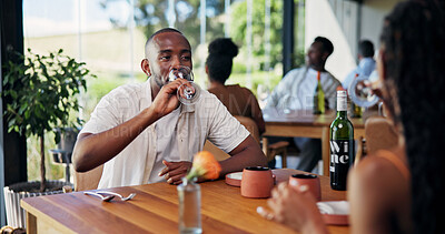 Buy stock photo Drinking alcohol, hospitality and man in restaurant, date and love with Valentines day. Romantic, customer and couple with wine, tasting or anniversary with people or woman at luxury bistro.