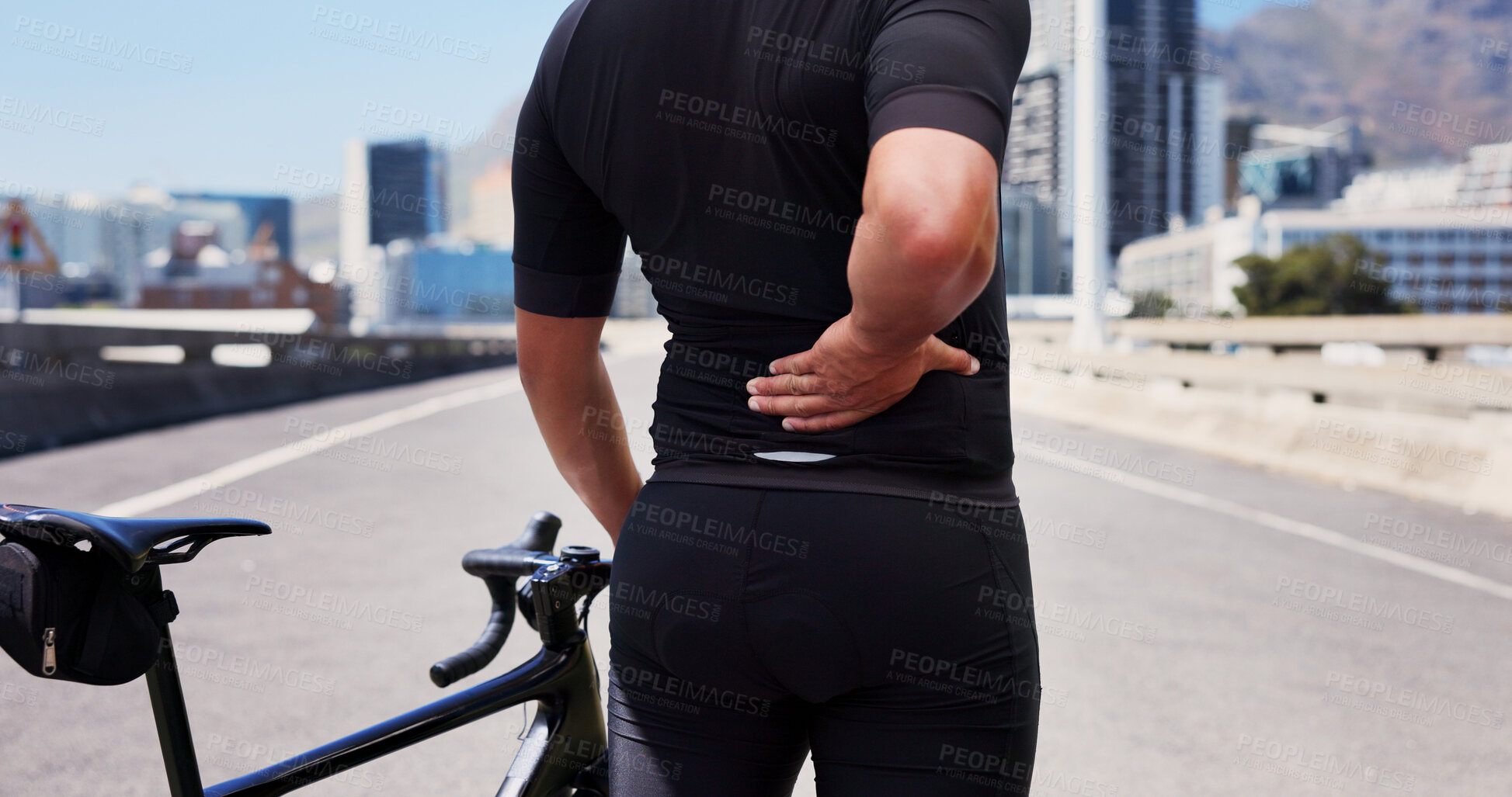 Buy stock photo Back pain, cyclist and fitness with man in city for workout mistake, sports injury and fibromyalgia. Muscle sprain, inflammation and cycling with person and bike for training fatigue and issue