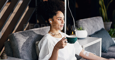 Buy stock photo Woman, iv infusion and tea in drip lounge, healthcare and music for medical treatment and streaming. Clinic, recovery and person with earphones for wellness, immune system boost and relax with matcha