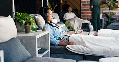 Buy stock photo Headphones, woman and relax at drip therapy in lounge for immune health, saline solution or music. People, calm patient or audio with IV vitamin c for wellness benefits, mineral infusion or hydration