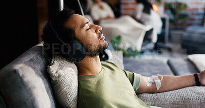 Buy stock photo Man, sleep and iv drip with headphones for healthcare, iron infusion or immune booster in clinic. Male patient, rest or audio tech in medical lounge for intravenous solution, vitamin therapy or music