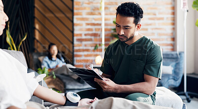 Buy stock photo Clipboard, blood pressure and nurse with client in iv bar for dehydration check, fluid retention and planning. Patient dosage, vital signs and healthcare with people in spa for supplement treatment