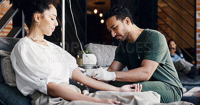 Buy stock photo Patient, nurse or IV therapy in lounge with drip preparation, mineral infusion or immune health. People, healthcare worker and injection with intravenous fluid for saline solution at wellness center