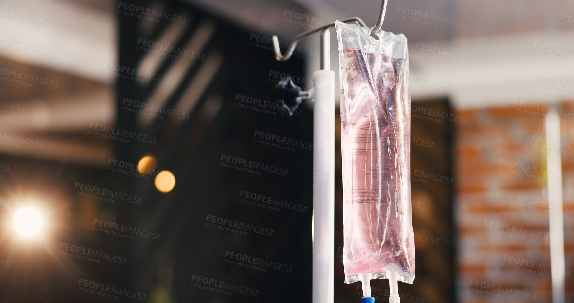 Buy stock photo IV drip, bag or solution in clinic for healthcare, iron infusion or mineral treatment with flare. Bokeh, intravenous medicine or liquid in health center for vitamin therapy, antioxidants or hydration
