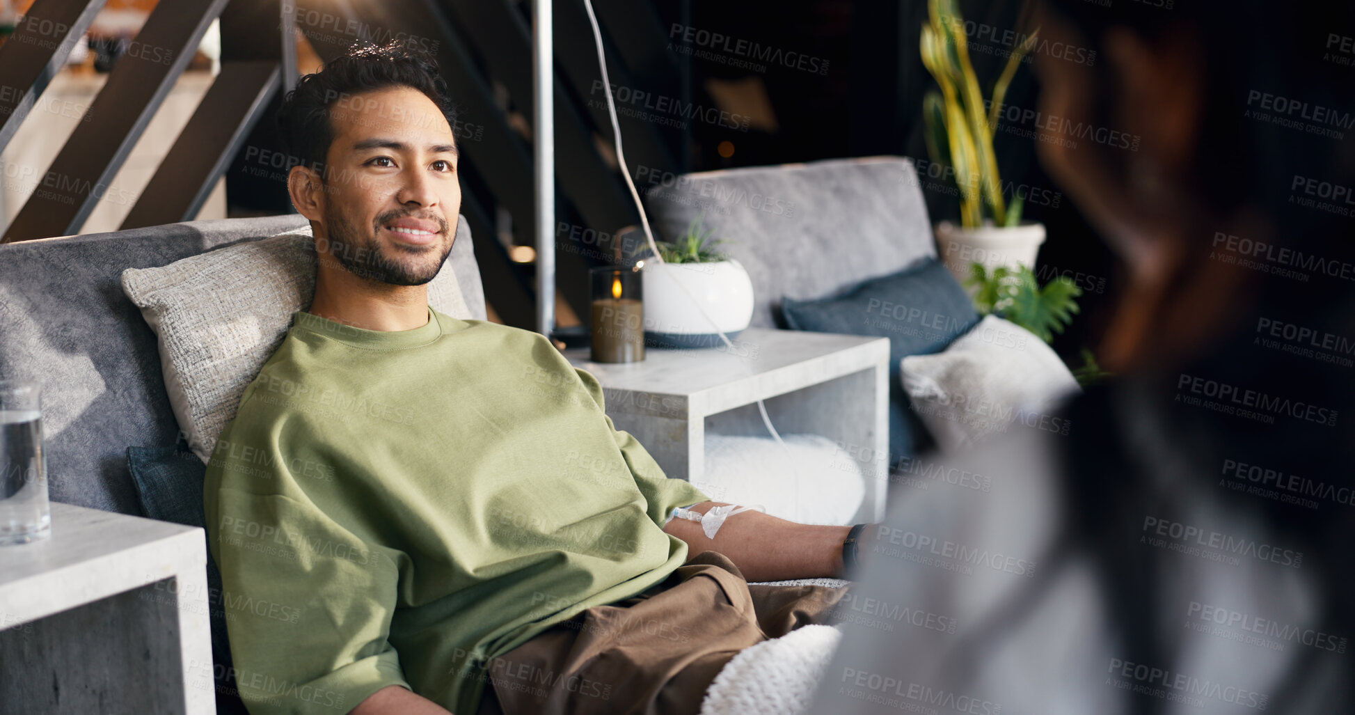 Buy stock photo Doctor, man and wellness in clinic with iv drip, natural medicine or discussion for hydration benefits. Healthcare worker, people and talking with intravenous fluid, homeopathic drugs or supplements.