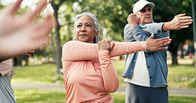 Buy stock photo Stretching, health and class with old woman in park for learning, mobility exercise and fitness club. Muscle warm up, wellness and balance with senior people for low impact workout and instructor