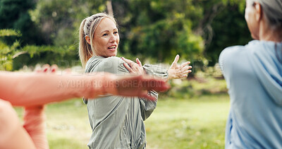 Buy stock photo Stretching, fitness and instructor with woman in park for learning, mobility exercise and health club. Muscle warm up, wellness and balance with senior people for low impact workout and class