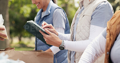 Buy stock photo Hands, person and typing on tablet outdoor for charity, online checklist and community service. People, parcel and digital for donation inventory, humanitarian outreach and ngo schedule of food drive