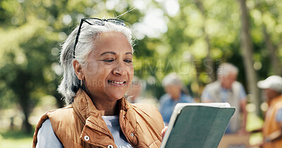 Buy stock photo Mature woman, volunteer and tablet at park for charity, online checklist and community service. Bokeh, female person and digital for donation inventory, humanitarian outreach and schedule for event