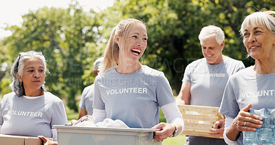 Buy stock photo Volunteer, walk or people in park with donations, conversation or collaboration in relief campaign. Laugh, teamwork or group outdoor with stroll, discussion or distribution in food drive project.