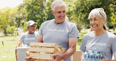 Buy stock photo Volunteer, walk or old people outdoor with donation, conversation or collaboration in relief campaign. Laugh, ngo or senior group outside with stroll, discussion or distribution in food drive project
