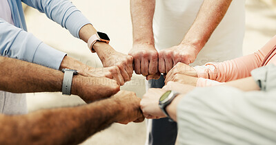 Buy stock photo Group, fitness and fist bump in circle for teamwork, unity and support for training outdoor. Hands together, people and collaboration for sports, workout motivation and community huddle for synergy