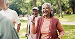 Woman, smile and old people in park with fitness, class and nature for senior exercise club. Retirement, hobby and personal trainer with mature group, outdoor or workout for health and wellness