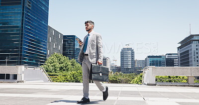 Buy stock photo Phone, walk and thinking with business man in city for communication, networking or travel. App, corporate person and direction with employee outdoor in urban town for morning commute or schedule