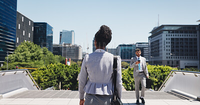 Buy stock photo Walking, back and businesswoman in city with travel for corporate legal career with commuting. Outdoor, man and professional lawyers with cellphone on route or journey in urban town in morning.
