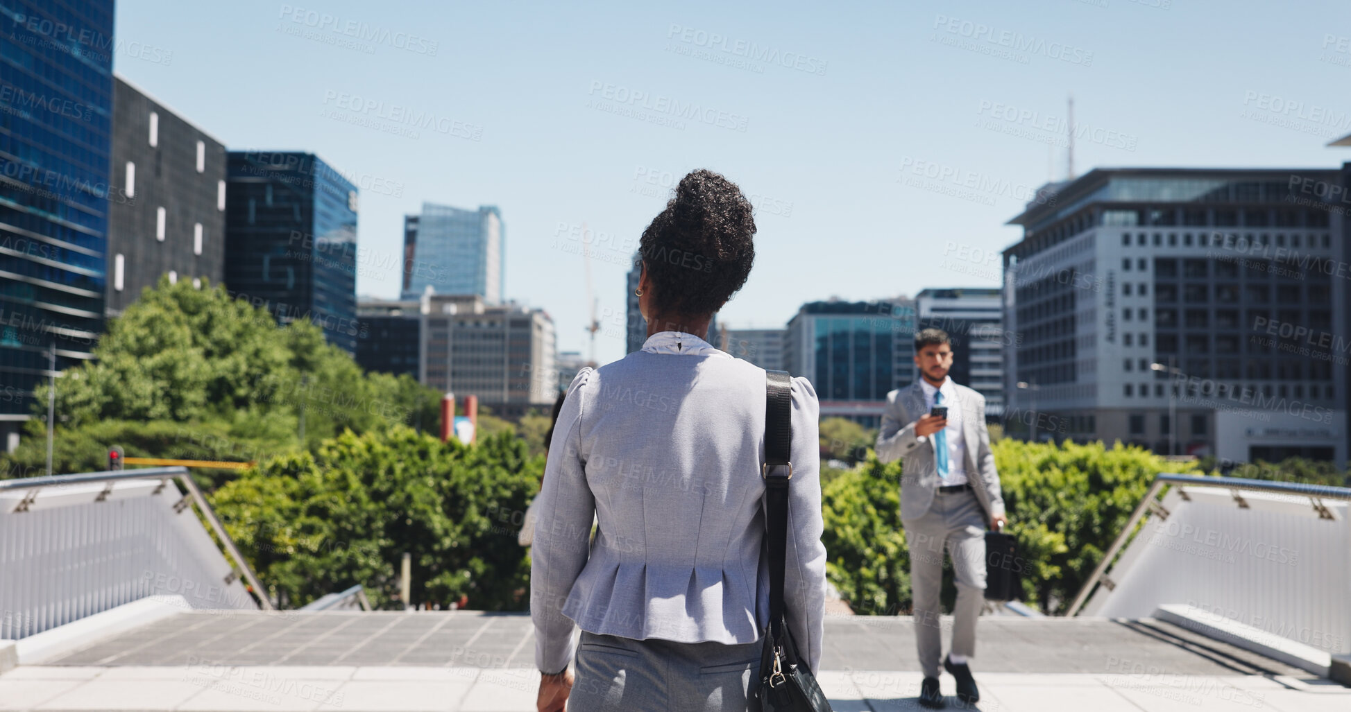 Buy stock photo Walking, back and businesswoman in city with travel for corporate legal career with commuting. Outdoor, man and professional lawyers with cellphone on route or journey in urban town in morning.