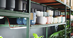 Pottery, shelf and pots in empty room of store for manufacturing, retail and craft. Ceramic production, earthenware display and clay with interior of small business for design, creative and stock