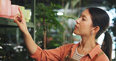 Buy stock photo Pot, shelf and nursery with woman in store for plant growth specialist, startup and entrepreneur. Stock inspection, florist and small business with person in shop for gardening expert and botany