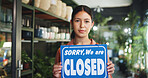 Business owner, closed sign or portrait of woman by nursery door, service communication or info for customer. Garden center, availability message or entrepreneur by entrance, notice board or day end