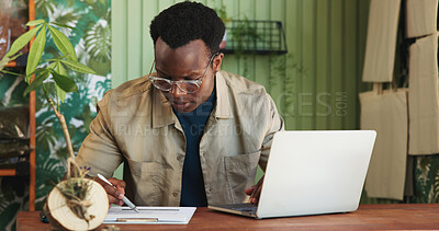 Buy stock photo Laptop, documents and plant with black man in store for delivery checklist, account report and botany review. Order confirmation, ecommerce and florist entrepreneur with person in small business