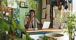 Laptop, thinking and plant with black man in store for delivery checklist, account report and botany vision. Order confirmation, ecommerce and florist reflection with person in small business