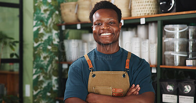 Buy stock photo Black man, portrait and arms crossed in sustainable business with smile, botany and eco friendly career. Entrepreneur, confidence and happy in nursery with pride, consultant and startup garden center