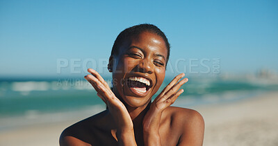 Buy stock photo Black woman, excited and skincare at ocean for travel, sun protection and hand frame on vacation. Person, dermatology and happy on beach for summer holiday, SPF benefits and confident with freedom