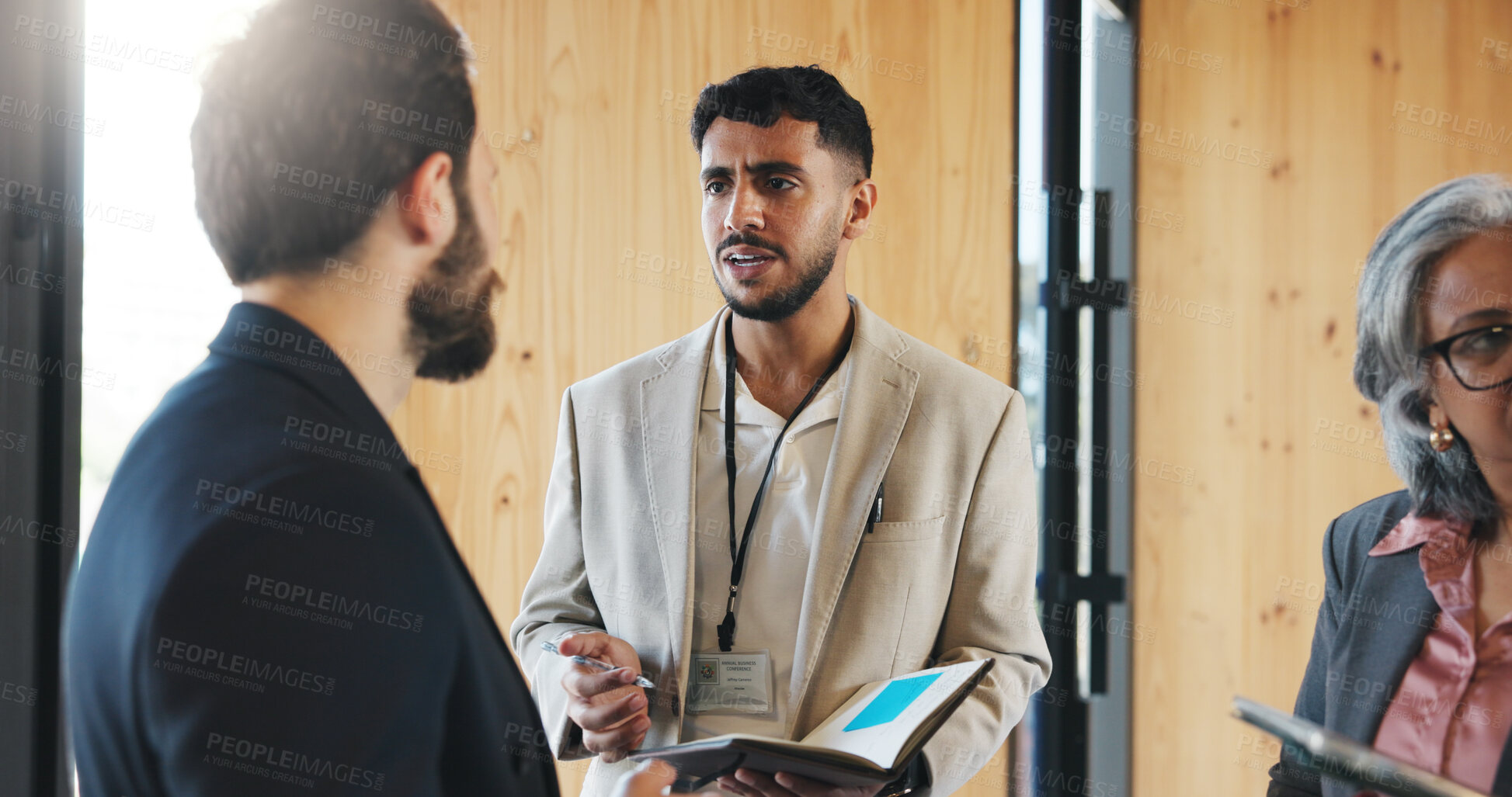 Buy stock photo Seminar, journalist and talking with businessman, interview and conversation for company performance. Press conference, discussion and reporter with notes for story, people and meeting for questions