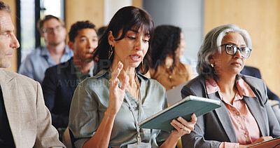 Buy stock photo Business woman, tablet and talk at seminar with group for corporate training, explain or respond at conference. Executive, tech and feedback with insight for professional development at convention