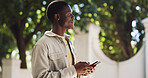 Black man, thinking and smartphone outdoor for communication or post ideas for social media platform. Male person, mobile phone and reflection in nature with chat app for email, texting or contact