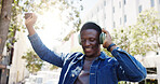 Black man, student and dancing in city with headphones, favorite song or rhythm on morning commute. Person, college academic or streaming music in town with energy, travel or positive for scholarship