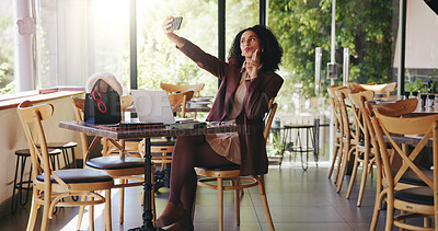 Buy stock photo Woman, selfie and peace sign in restaurant for remote work, blog update and content creation. Hand v, employee and photography in cafe for networking, share post online and follower engagement