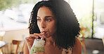 Woman, drink match and coffee shop with thinking, iced beverage for thirst, refreshing or hydration with straw. Green smoothie, milkshake and person with cold liquid in glass for reflection at cafe