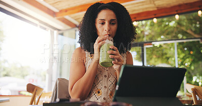 Buy stock photo Woman, drink and reading on tablet for remote work, proofreading article and research in cafe. Freelance writer, ice matcha or tech in restaurant for latest news, online information or creative blog