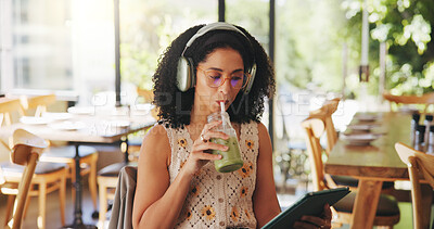 Buy stock photo Woman, headphones and tablet in cafe with drink, audiobook or check online university portal. Student, tech for learning platform or reading with matcha or listen to podcast at college cafeteria