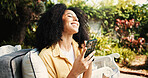Outdoor, laughing and woman with smartphone, home and message on social media app, happy or chilling. Backyard, texting and person with mobile for communication, online and funny post on website