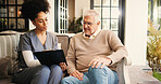 Clipboard, discussion and nurse with senior man on sofa for consultation at retirement home. Healthcare checklist, checkup and caregiver with elderly male patient in living room for medical diagnosis