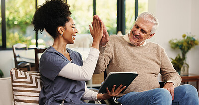 Buy stock photo High five, tablet and nurse with old man on sofa in house for support, healthcare advice and help. Elderly care, medical assistance and positive results with senior person and tech in nursing home