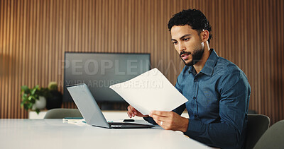 Buy stock photo Man, reading and laptop in office with paperwork for finance report, business proposal and budget info. Auditor, person and evaluation in workplace with computer, document review and financial plan.