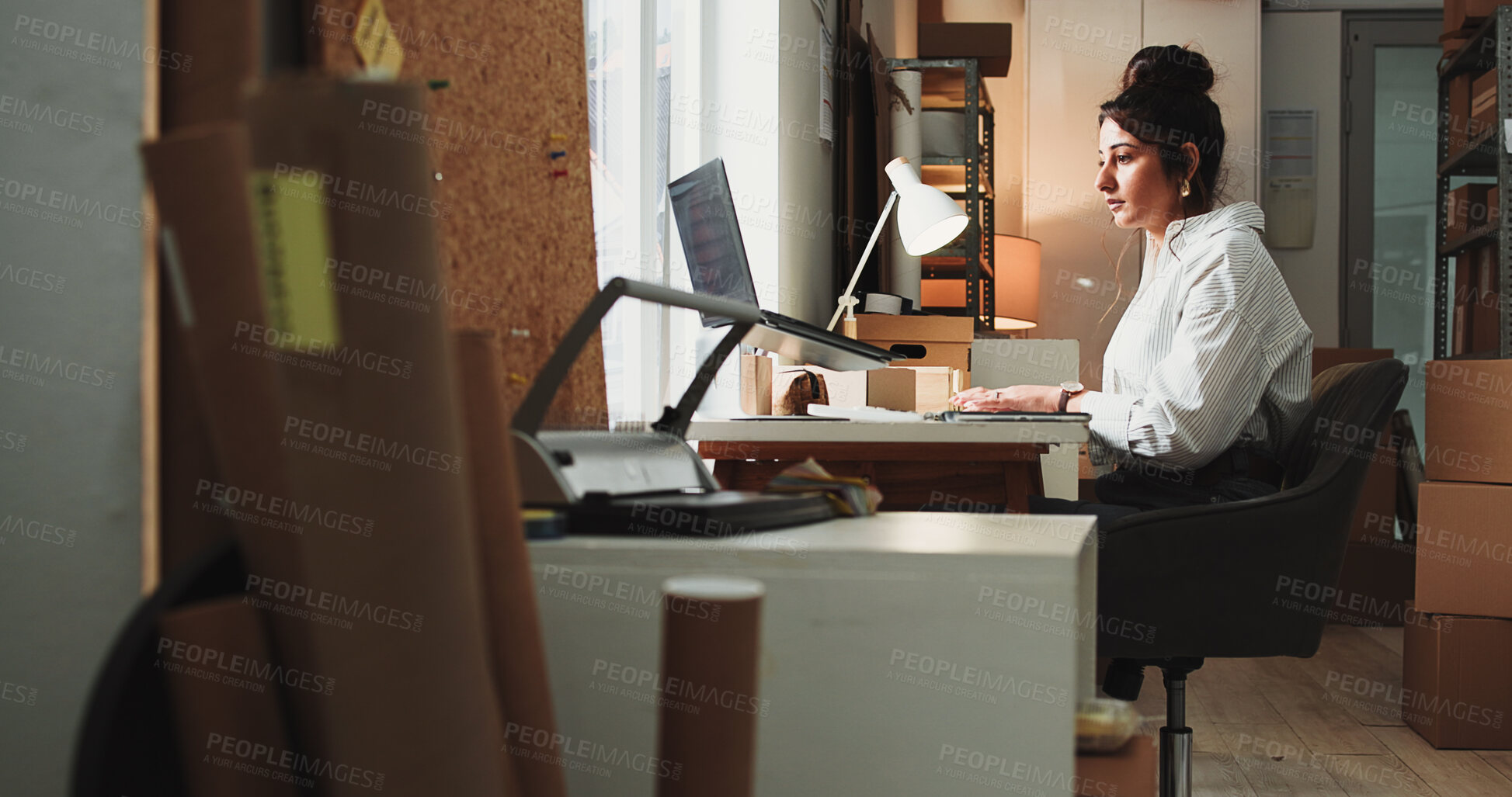 Buy stock photo Ecommerce, woman and browsing in office with laptop for online order, process sales or shipping feedback. Person, typing and reading email in workplace with computer, logistics and supply chain info.