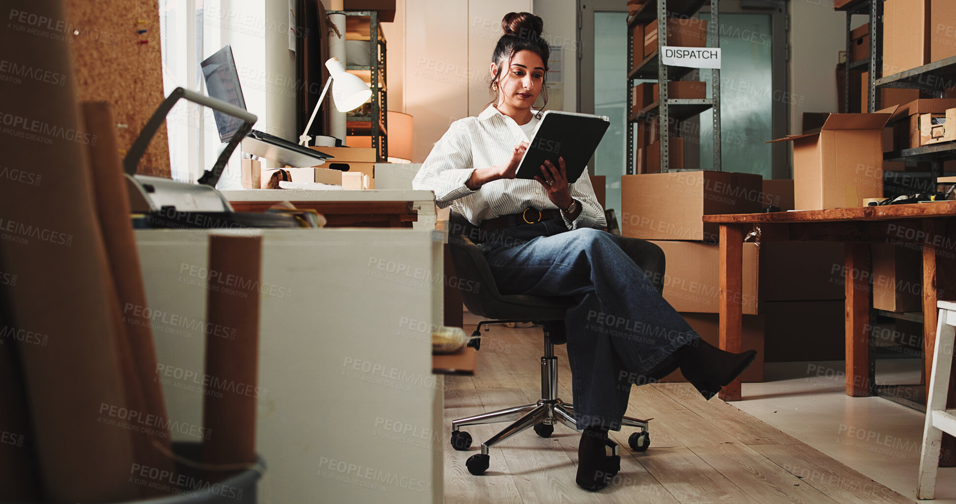 Buy stock photo Ecommerce, woman and typing in office with tablet for online order, process sales or shipping feedback. Female person, scroll and email in workplace with tech for logistics, supply chain or delivery.