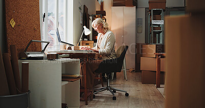 Buy stock photo Ecommerce, woman and typing in office with laptop for online order, process sales or shipping feedback. Mature person, browsing and check email in workplace with computer, logistics or delivery info.