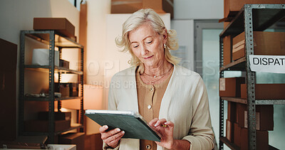 Buy stock photo Shipping, startup and woman with tablet, scroll and order review on website, ecommerce and logistics. Browsing, online and mature person with tech for stock inventory, delivery and goods distribution