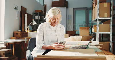 Buy stock photo Happy, woman and dropshipping with smartphone, startup or order review on web, scroll and logistics. Check, sales and mature person with mobile for distribution updates, stock and smile in warehouse